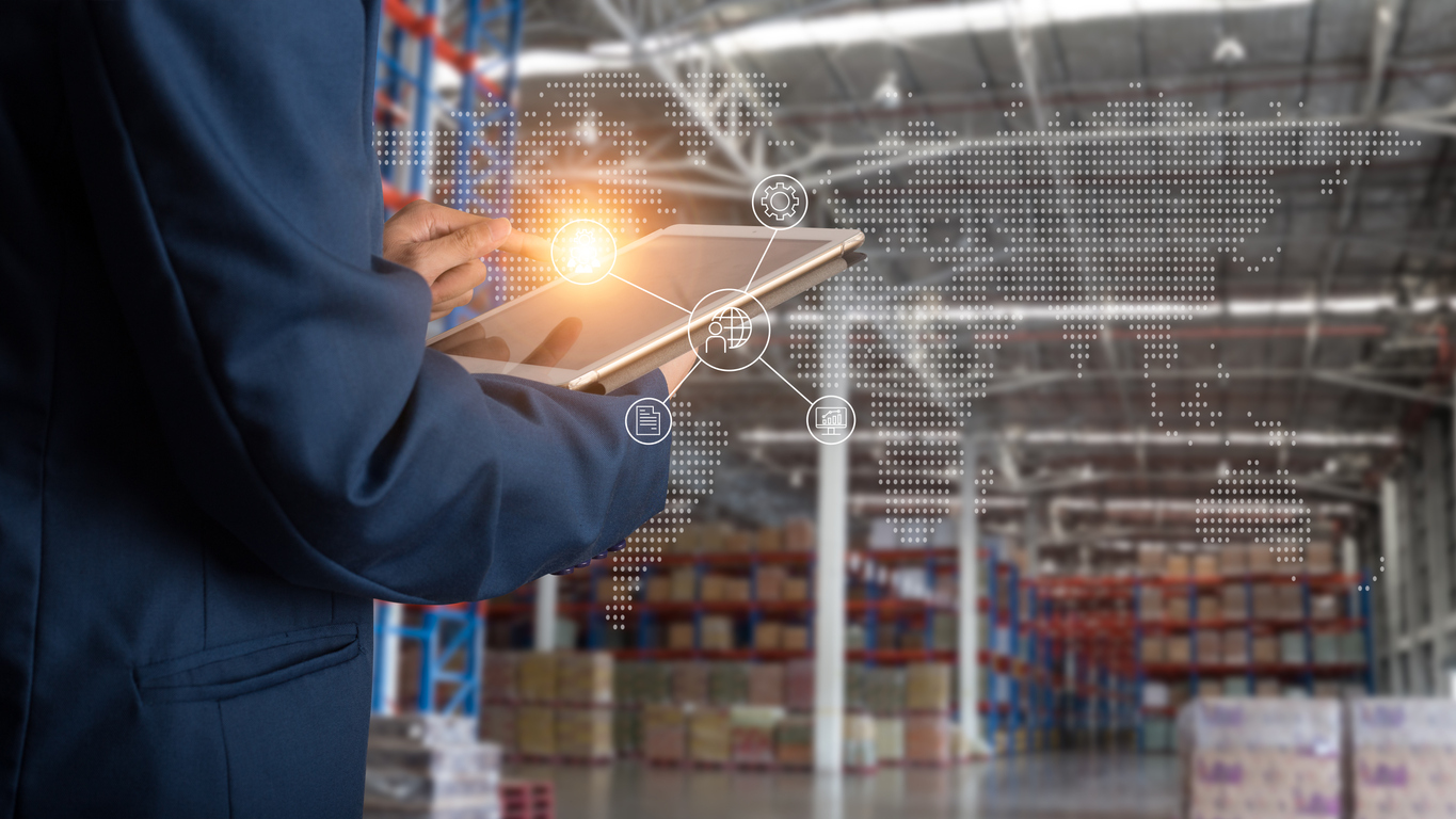vendor managed inventory benefits — Logistic and transport concept : Businessman manager using tablet check and control and planning for Modern Trade warehouse logistics.