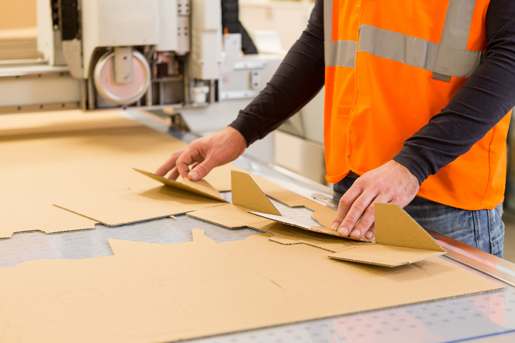 corrugated box design — Folding cardboard at the printing plant